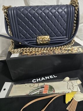CHANEL Navy Quilted Leather Boy Bag with Gold Hardware